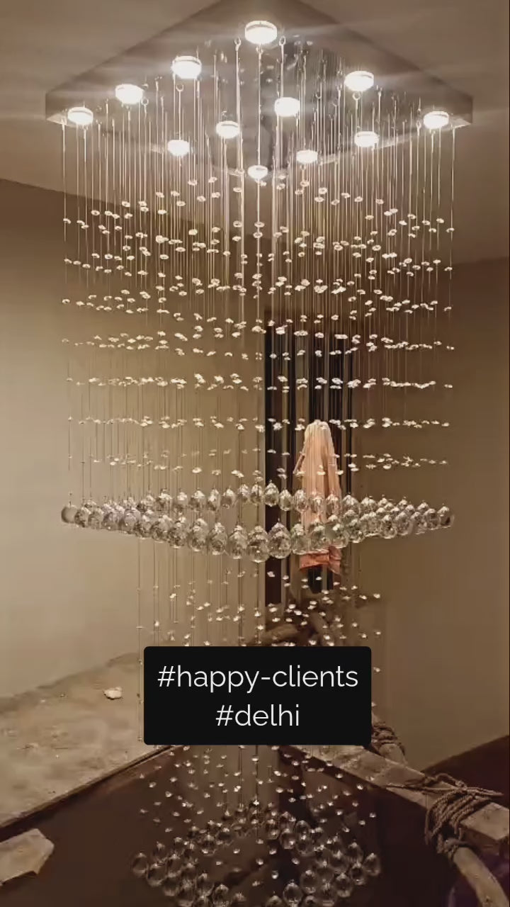Load video: Harmonics Crystal Duplex Chandelier Prosper Lighting